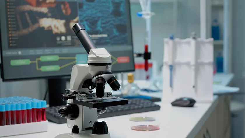 microscope analyzing hair sample